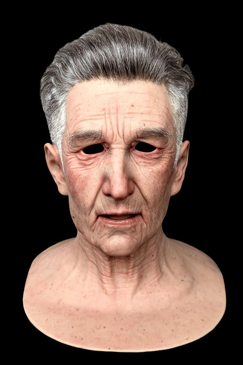Life-like mask of an elderly man on a black background